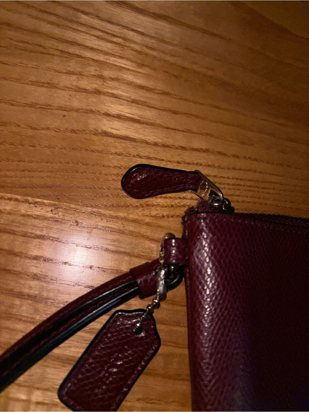 Coach Burgundy Pebbled Leather Wristlet with Gold Logo - Picture 3 of 6